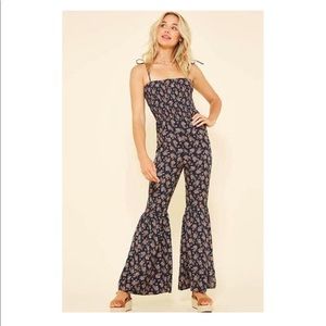 Floral print, navy blue bell bottom jumpsuit